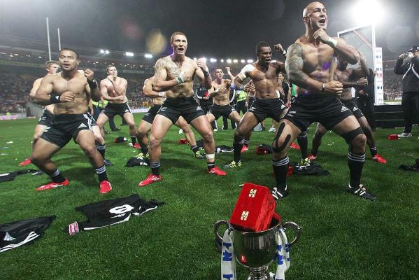 Players celebrate win with the Haka